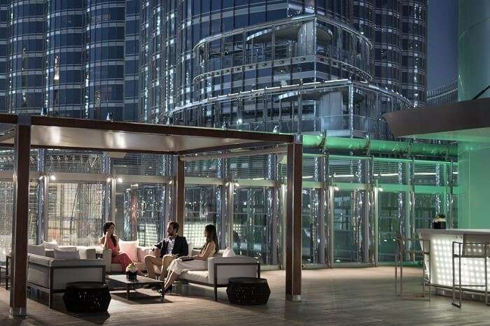 Guests relax at the Burj Club Rooftop in Burj Khalifa