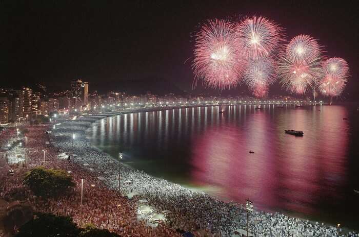 An illuminated party beach during Hawaii New Year celebrations