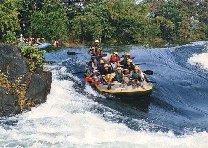 Tourists enjoy rafting in the white waters at Dandeli
