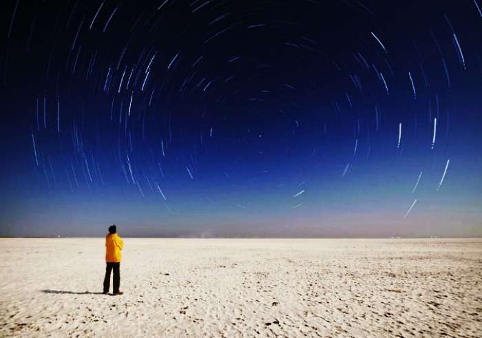 White marsh of Rann of Kutch shimmering under a starlit sky