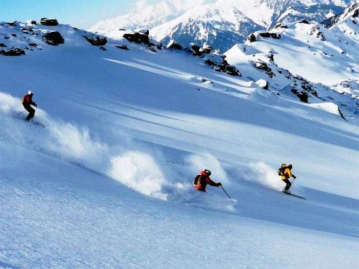 Enjoy skiing in the picturesque snow-capped peaks of Auli