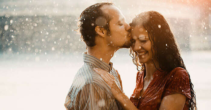 romantic couple in rainy season