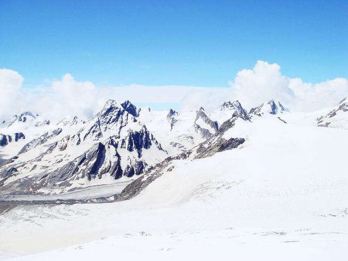 Stunning view of the snow capped peaks and hanging glaciers in Khatling