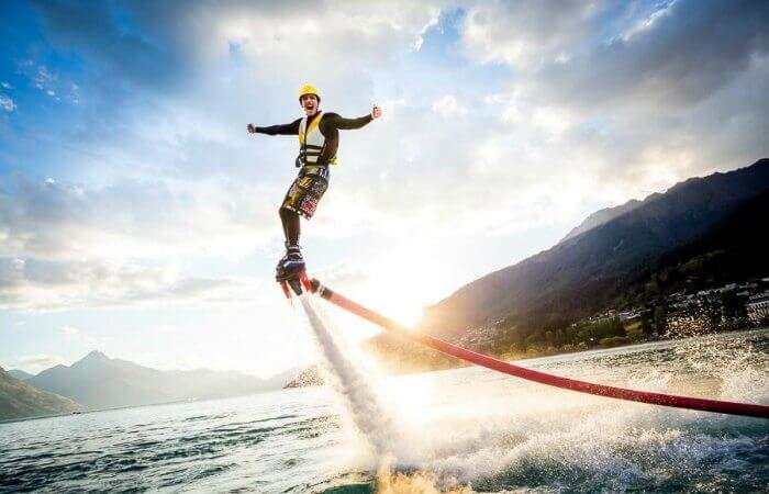 A man performing flyboarding in Goa