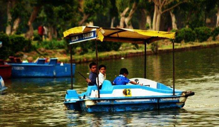 Paddle boating in a lake near one of the best picnic spots in Delhi - India Gate