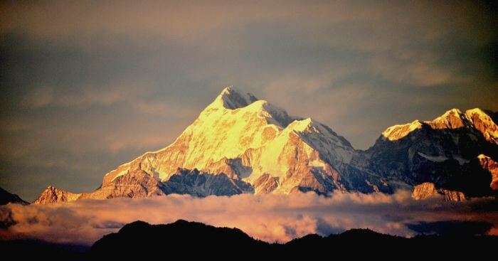 The peaks of Nanda Devi turn golden at Sunset