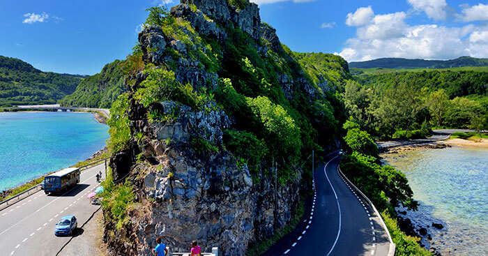 a curvy road in the mountains