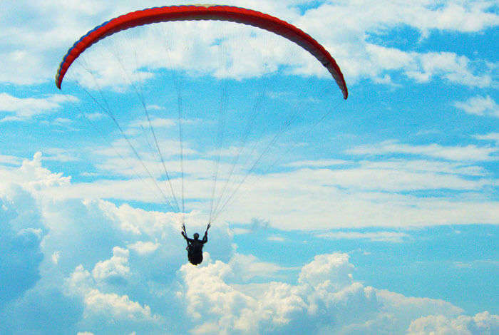 A flyer while paragliding in Bangalore