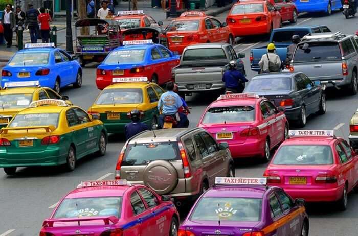 Hot pink taxis famous for their quick service and colour