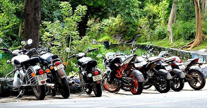 Bikes from the Tamil Nadu road trip that James took lined on a highway