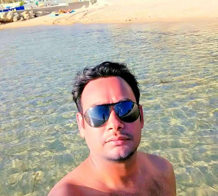 Niket clicks a selfie on the beach in Nice