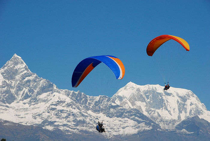 Enjoy adventure activities at Solang Valley like paragliding