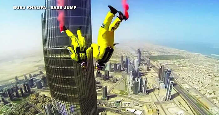 Skydivers base jumping from Burj Khalifa