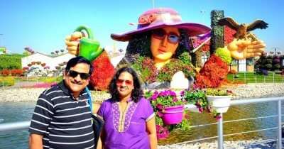 Raman and his wife pose on their family trip to Dubai