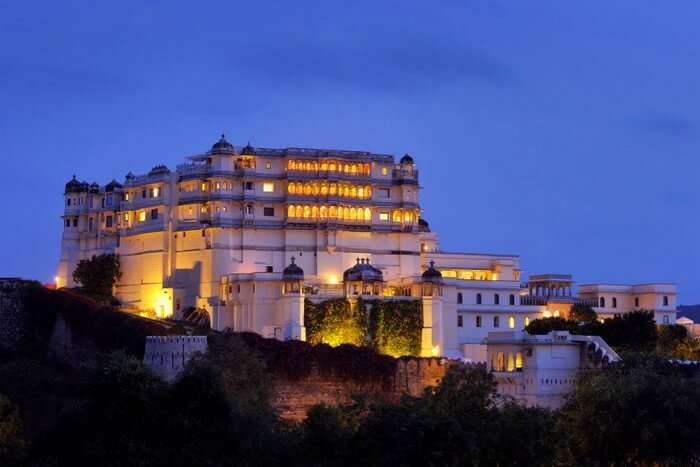 Brightly-lit Raas Devigarh hotel from outside