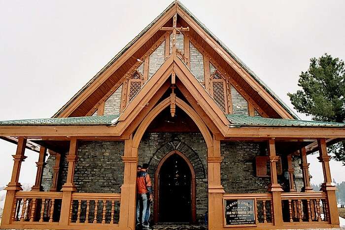 Tourists visit the colonial-style St Mary Church in Gulmarg