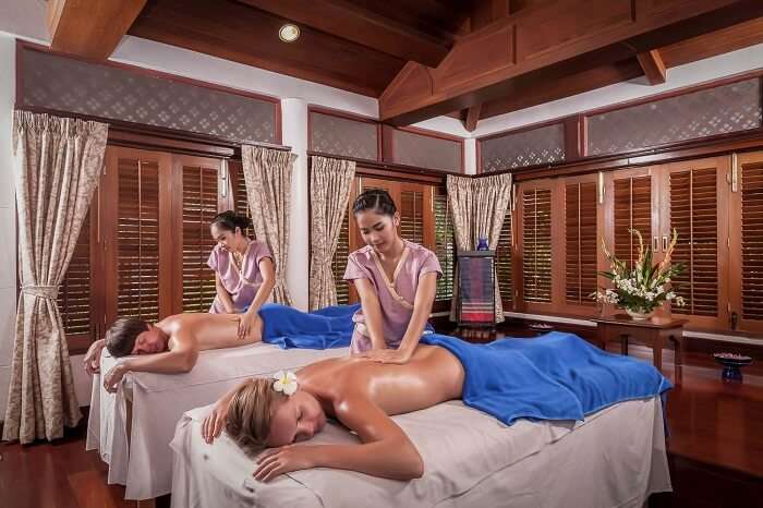 Tourists enjoying Thai massage