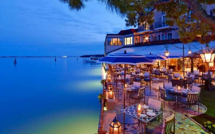 The outdoor restaurant seating area at Belmond Hotel Cipriani