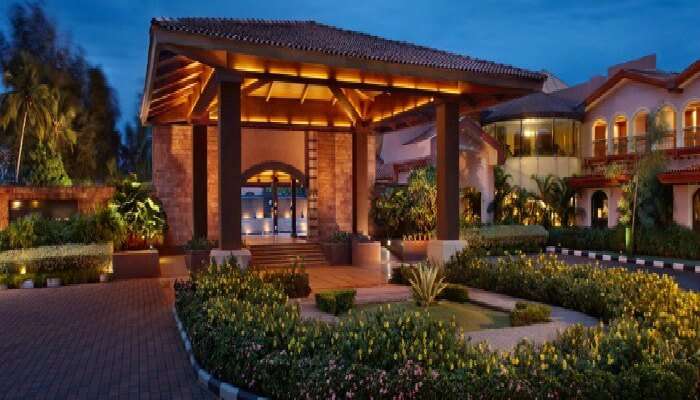The outer pool deck of the Novotel Goa Resort & Spa
