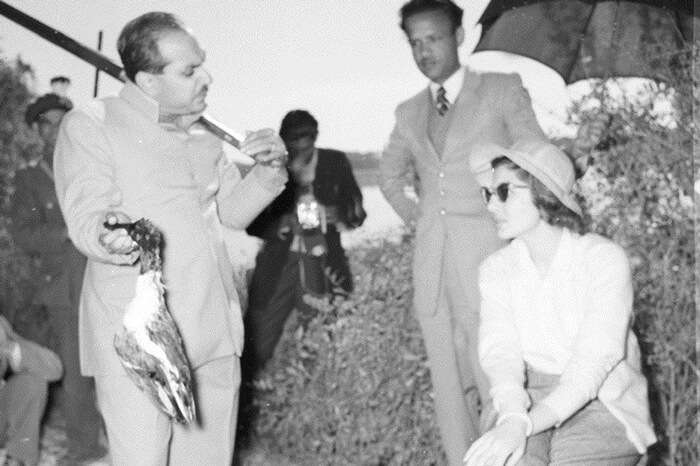 A 1956 archive photo of Maharaja of Bharatpur showing a duck to her Imperial Majesty the Queen after a hunting round