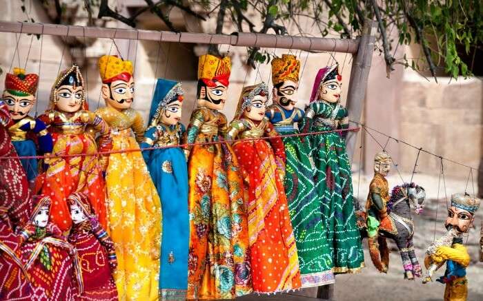 Colorful puppets displayed at Rajasthan shopping places