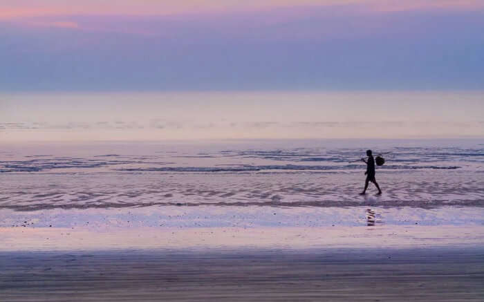 A local taking a stroll on Bordi Beach