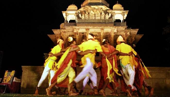 Locals performing a folk dance on the occasion of Bundi Utsav