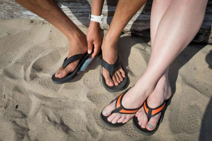 A traveler inserting a card in his slot flops