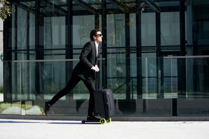 Wheeled bag opens up to turn into an easy scooter