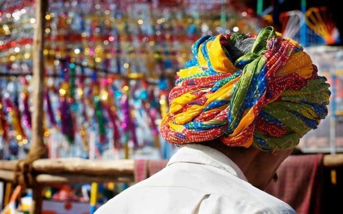 Local man in colorful turban in a market in Pushkar
