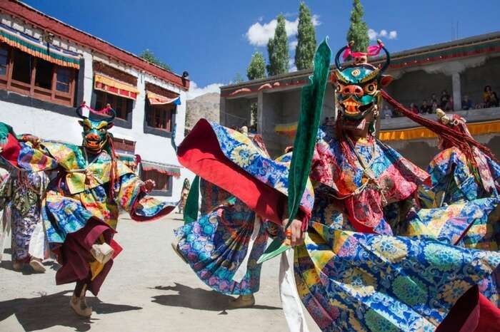 Ladakhis wearing silk costumes and mask celebrate Phyang in Leh