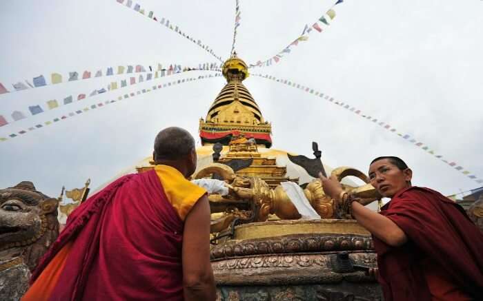 Buddhist monks make offerings during Losar Festival in Nepal