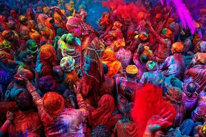 Celebrating holi festival in Vrindavan