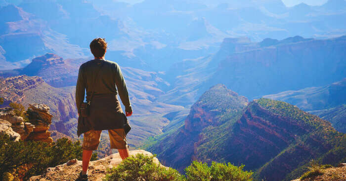 Christian Lindgren standing on the mountain edge