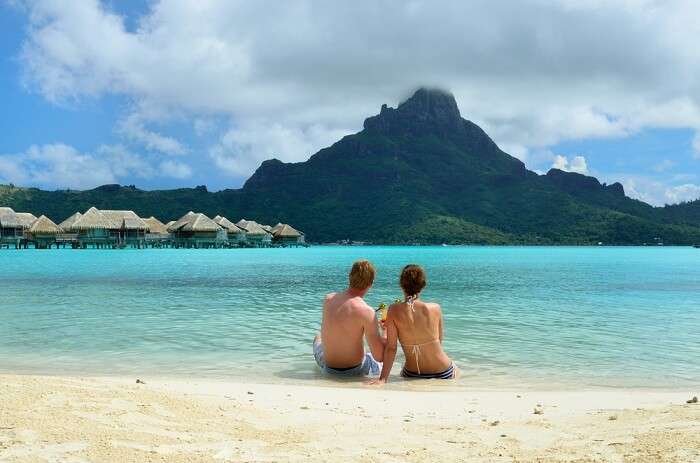 Honeymoon couple on Bora Bora beach