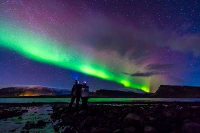 Couple enjoying a romantic night full of stargazing
