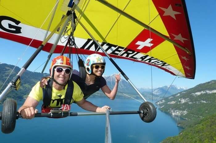 honeymoon couple hang gliding in Italy