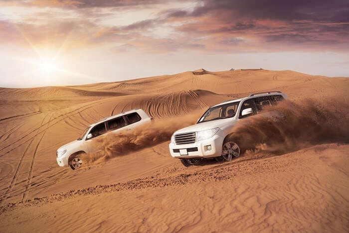 Honeymoon couple dune bashing in Dubai