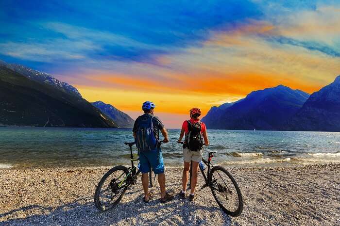 Honeymoon couple mountain biking in Italy