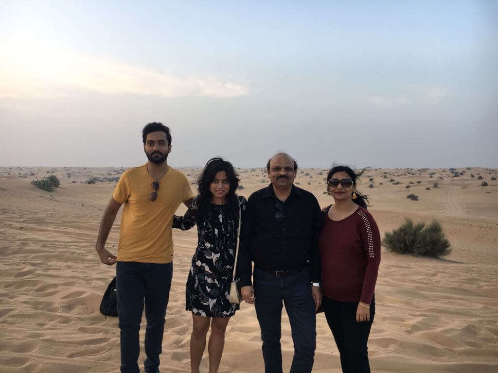 Family in Dubai sand dunes
