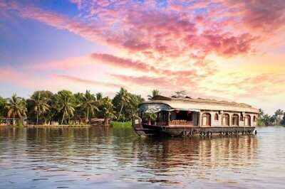 backwater cruising in houseboat in Kerala which is counted among the best places to visit in India in May