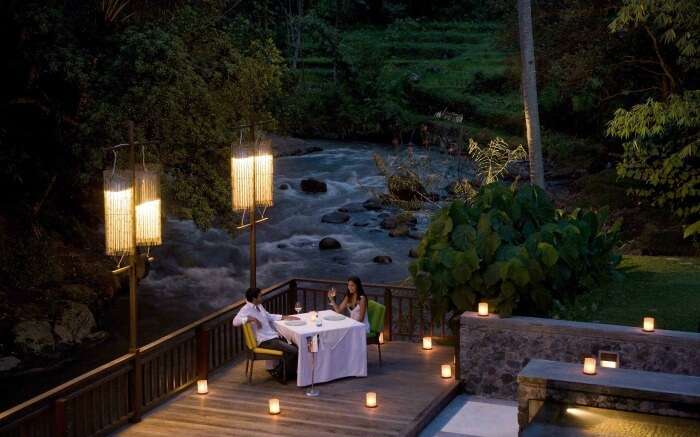 A couple enjoying hundred candles dinner in Bali