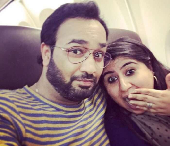 Neha and her husband on their flight to Vietnam