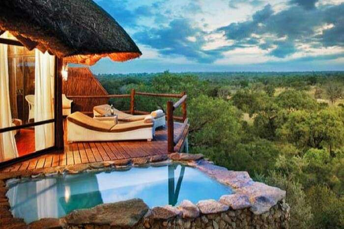 A jungle lodge by the bushes in game reserve in South Africa