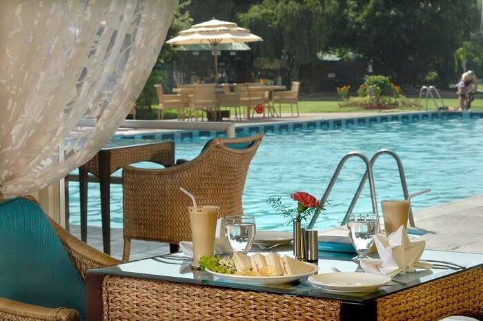 A shot of the poolside coffee lounge at the Country Club Resort near Gurgaon