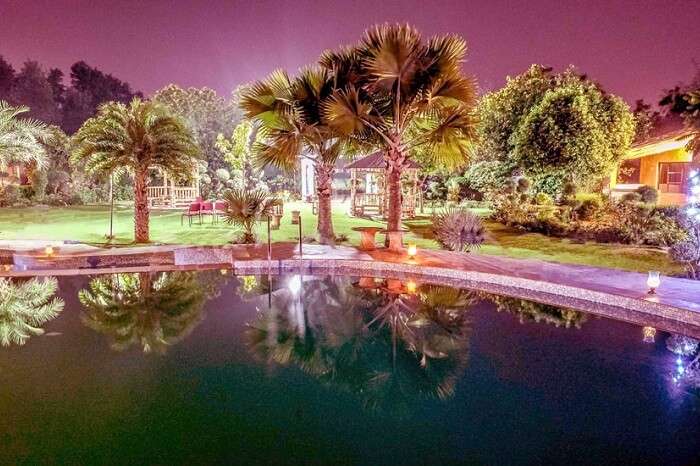 An evening shot of the pool at the Botanix Resort near Gurgaon