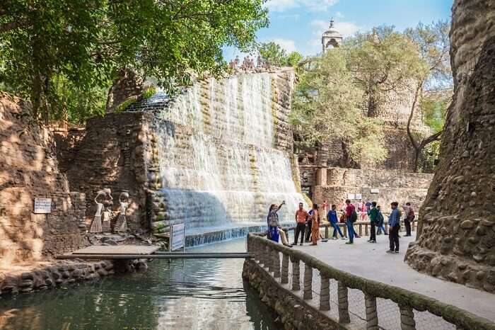 Tourists taking a tour of the Rock Garden in Chandigarh