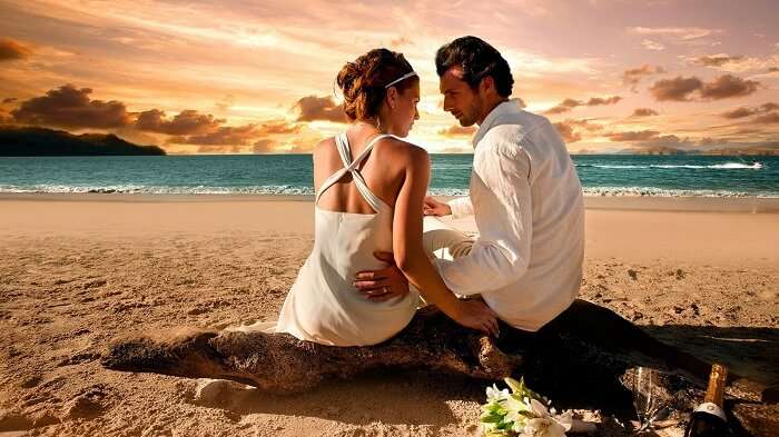 Couple sitting on the beach in Antalya