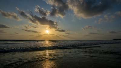 sunset at Kashid beach, one of the best places to visit in Maharashtra in summer famous for white sand and crystal clear sea