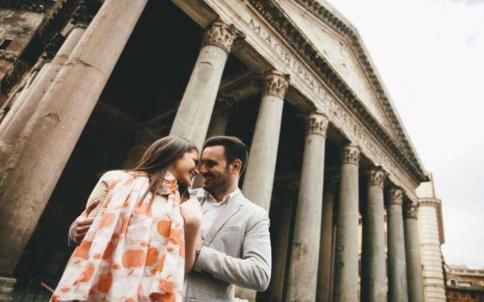 A couple in front of the Pantheon - one of the best places to visit a honeymoon in Rome